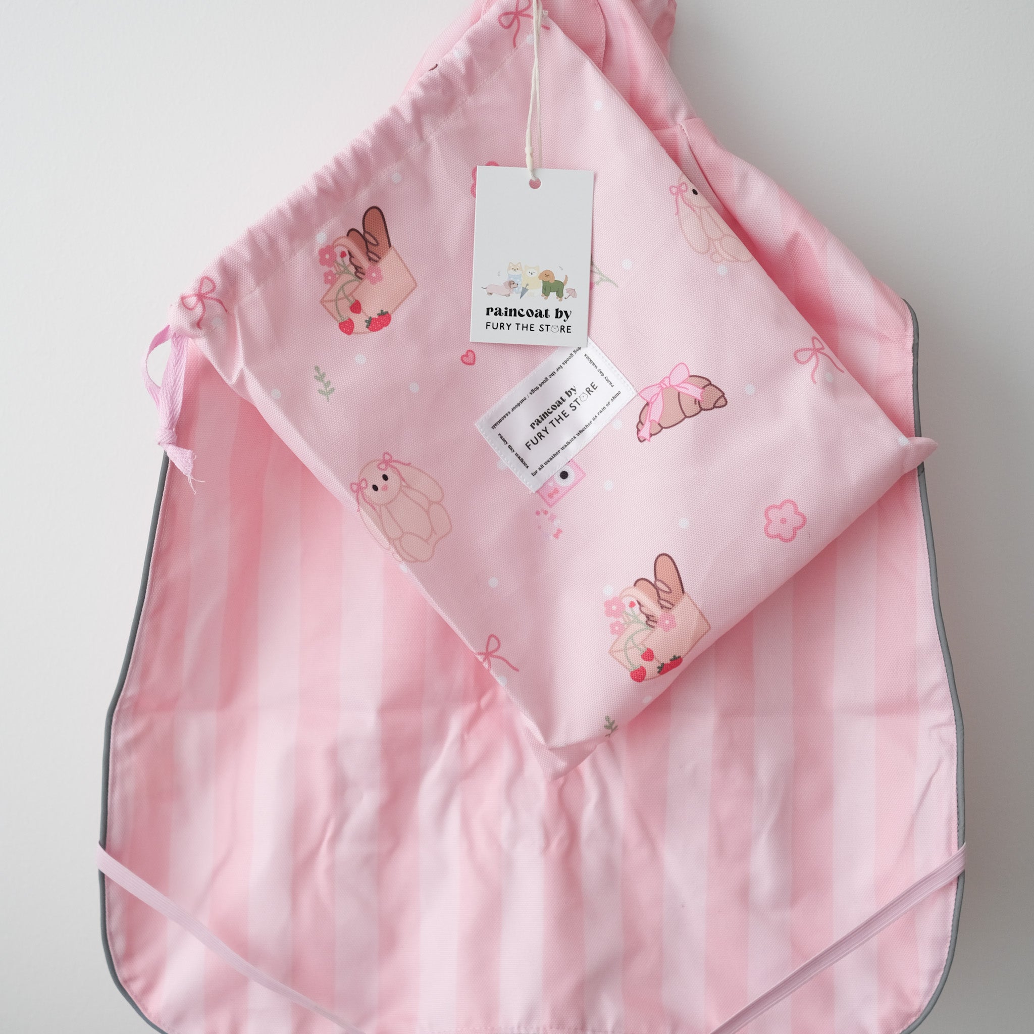 the good girl reversible raincoat